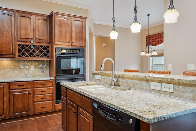 6711 Cooperstone Dr, Dublin, OH 43017 - kitchen with black appliances, a sink, ornamental molding, backsplash, and light stone counters