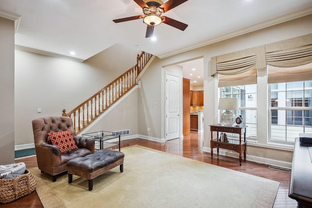 6711 Cooperstone Dr, Dublin, OH 43017 - living area with a ceiling fan, stairway, wood finished floors, ornamental molding, and recessed lighting