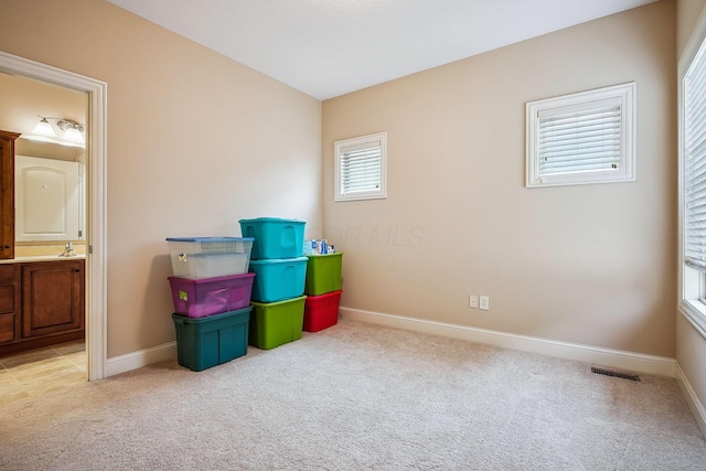 6711 Cooperstone Dr, Dublin, OH 43017 - recreation room featuring light carpet and baseboards