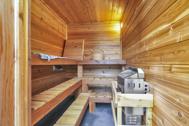 942 Mount Vernon Rd, Newark, OH 43055 - relaxing sauna with wood walls, concrete flooring, and wood ceiling