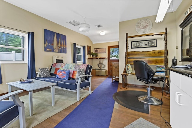 942 Mount Vernon Rd, Newark, OH 43055 - living room featuring wood finished floors and heating unit
