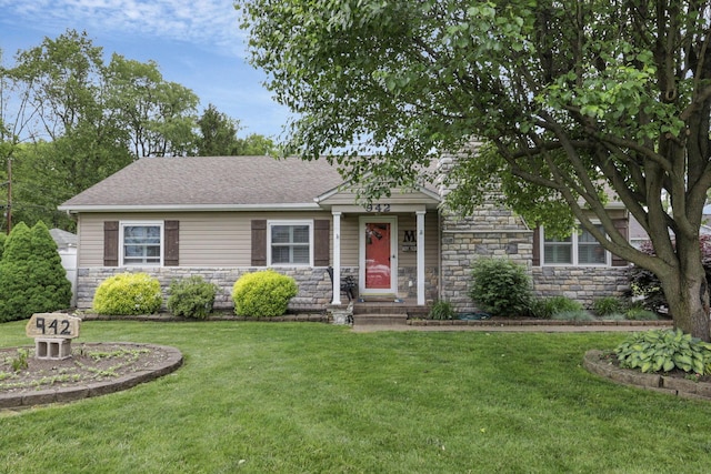942 Mount Vernon Rd, Newark, OH 43055 - view of front of home featuring stone siding, a front yard, and roof with shingles