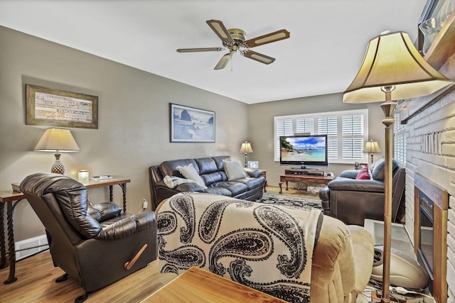 942 Mount Vernon Rd, Newark, OH 43055 - living area featuring ceiling fan, wood finished floors, and a fireplace