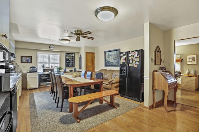 942 Mount Vernon Rd, Newark, OH 43055 - dining room featuring light wood-style floors and a ceiling fan