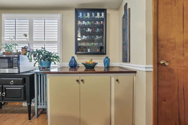 942 Mount Vernon Rd, Newark, OH 43055 - detailed view of stainless steel microwave and wood finished floors