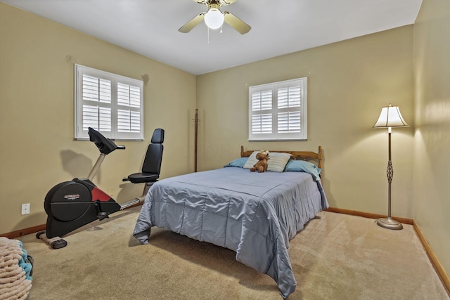942 Mount Vernon Rd, Newark, OH 43055 - carpeted bedroom featuring multiple windows, baseboards, and ceiling fan