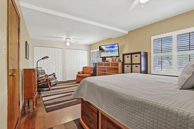 942 Mount Vernon Rd, Newark, OH 43055 - bedroom with wood finished floors, multiple closets, and a ceiling fan