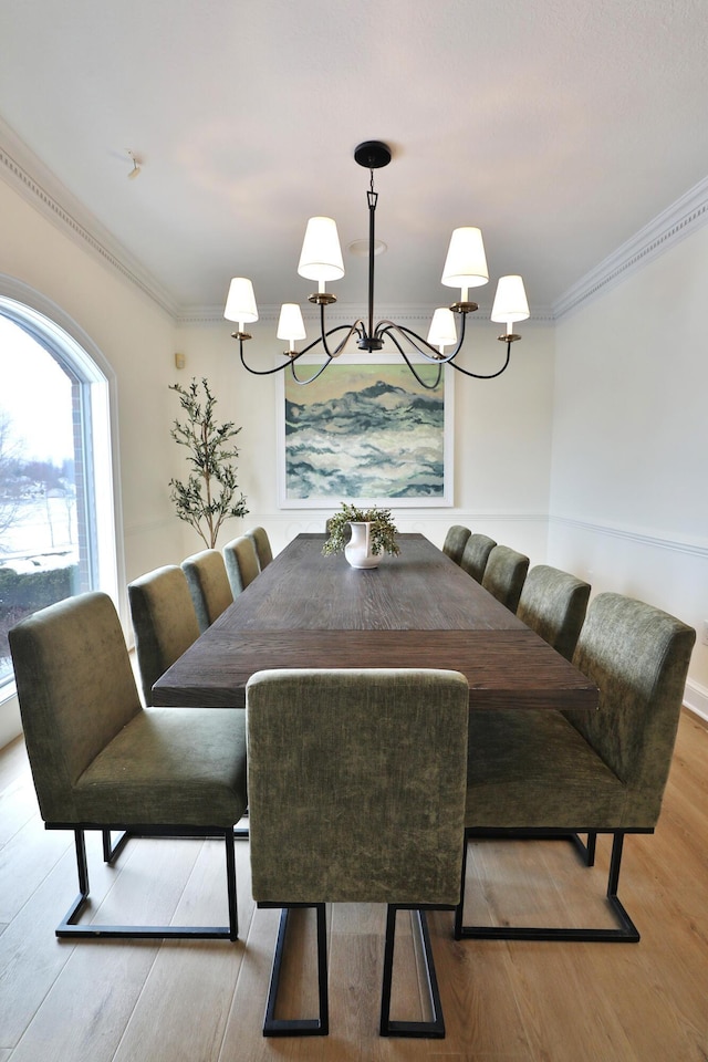 2300 Stonewall Cemetery Rd SW, Lancaster, OH 43130 - dining space featuring a chandelier, wood finished floors, and crown molding