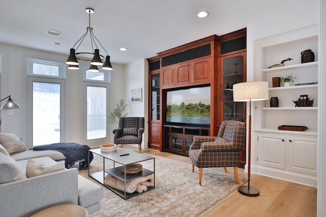 2300 Stonewall Cemetery Rd SW, Lancaster, OH 43130 - living room with light wood-type flooring, recessed lighting, and a chandelier