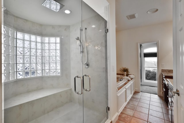 2300 Stonewall Cemetery Rd SW, Lancaster, OH 43130 - bathroom with healthy amount of natural light, a marble finish shower, vanity, and a bath