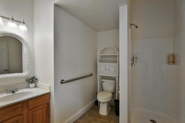 2300 Stonewall Cemetery Rd SW, Lancaster, OH 43130 - bathroom featuring a walk in shower, vanity, toilet, baseboards, and a textured ceiling
