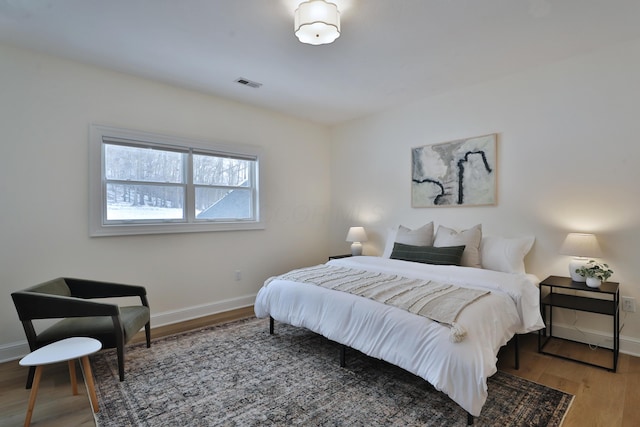 2300 Stonewall Cemetery Rd SW, Lancaster, OH 43130 - bedroom featuring baseboards and wood finished floors