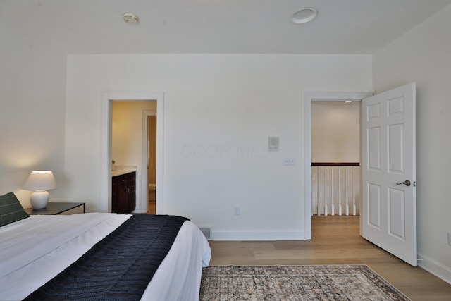 2300 Stonewall Cemetery Rd SW, Lancaster, OH 43130 - bedroom featuring wood finished floors, baseboards, and recessed lighting