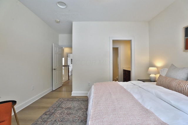 2300 Stonewall Cemetery Rd SW, Lancaster, OH 43130 - bedroom with wood finished floors and baseboards