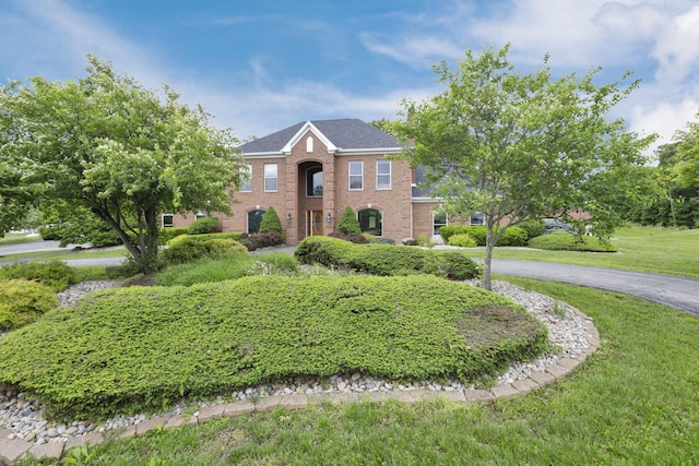 2300 Stonewall Cemetery Rd SW, Lancaster, OH 43130 - colonial house featuring a front yard and brick siding