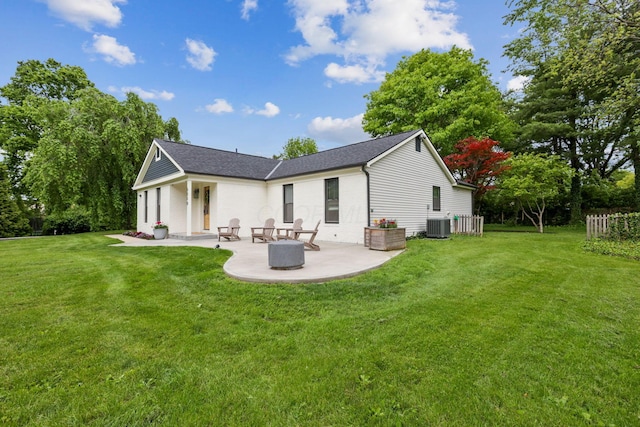 5210 Chevy Chase Ct, Columbus, OH 43220 - rear view of property with a patio, a lawn, and a shingled roof