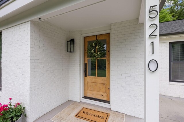5210 Chevy Chase Ct, Columbus, OH 43220 - doorway to property with brick siding