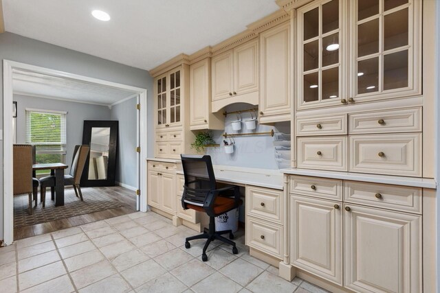 5210 Chevy Chase Ct, Columbus, OH 43220 - office area with built in desk, baseboards, light tile patterned floors, recessed lighting, and ornamental molding