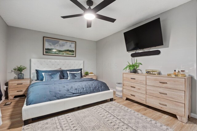 5210 Chevy Chase Ct, Columbus, OH 43220 - bedroom with light wood-style flooring and baseboards