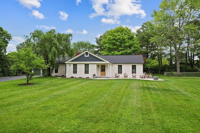 5210 Chevy Chase Ct, Columbus, OH 43220 - view of front of property with a front lawn and a patio
