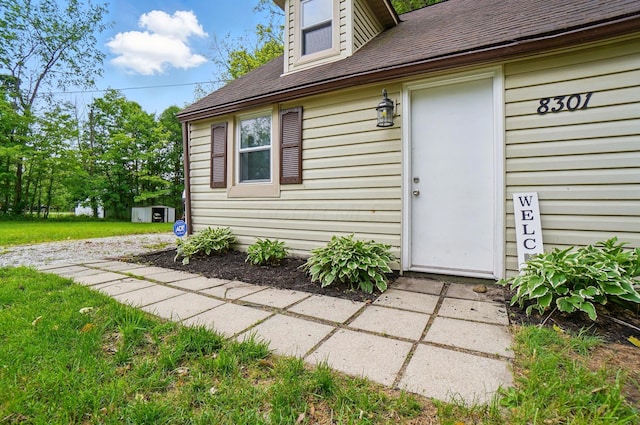 8301 Bennington Chapel Rd, Centerburg, OH 43011 - view of exterior entry featuring roof with shingles