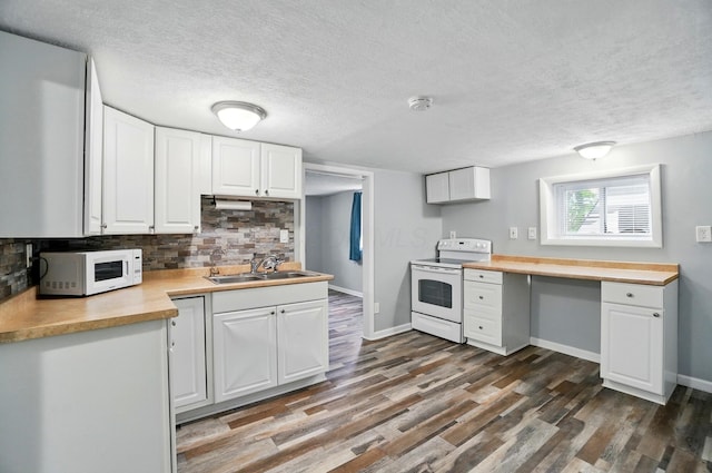 8301 Bennington Chapel Rd, Centerburg, OH 43011 - kitchen featuring white appliances, a sink, tasteful backsplash, a textured ceiling, and white cabinets