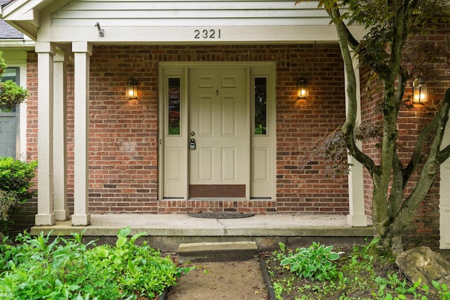 2321 Worthingwoods Blvd, Powell, OH 43065 - property entrance featuring covered porch and brick siding