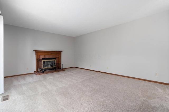 2321 Worthingwoods Blvd, Powell, OH 43065 - unfurnished living room featuring carpet, baseboards, and a brick fireplace