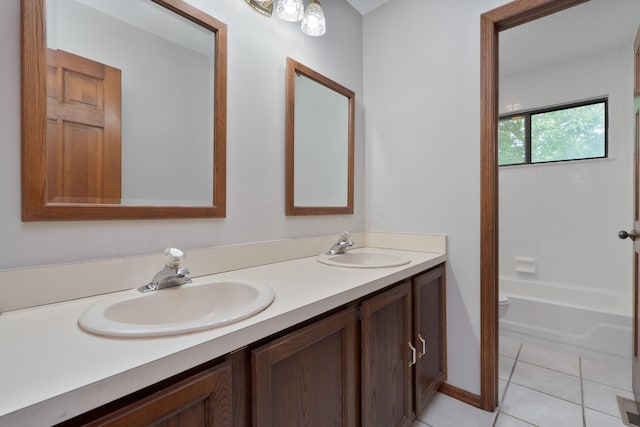 2321 Worthingwoods Blvd, Powell, OH 43065 - full bath featuring double vanity, toilet, tile patterned flooring, and shower / bathtub combination