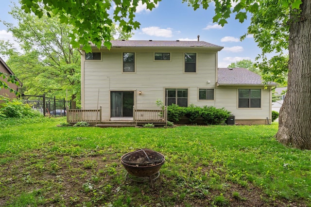 2321 Worthingwoods Blvd, Powell, OH 43065 - back of house featuring an outdoor fire pit and a wooden deck