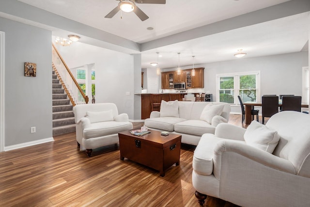 5552 Quail Hollow Way, Westerville, OH 43082 - living room with dark wood-style floors, a ceiling fan, and baseboards