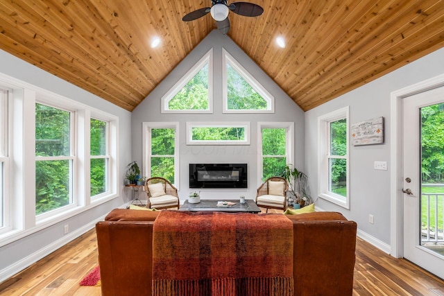5552 Quail Hollow Way, Westerville, OH 43082 - living room featuring hardwood / wood-style flooring, a glass covered fireplace, baseboards, wooden ceiling, and a ceiling fan