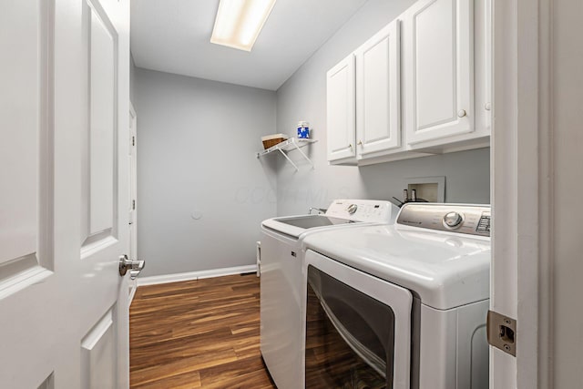 5552 Quail Hollow Way, Westerville, OH 43082 - laundry area with washer and dryer, dark wood-type flooring, baseboards, and cabinet space
