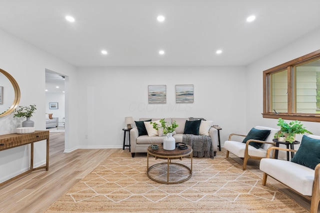 5148 Riverbirch Dr N, Columbus, OH 43229 - living area featuring light wood-type flooring, recessed lighting, and baseboards