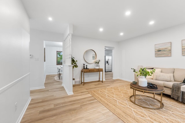 5148 Riverbirch Dr N, Columbus, OH 43229 - living room featuring light wood finished floors, recessed lighting, and baseboards