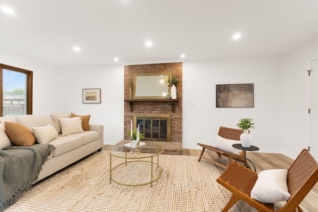 5148 Riverbirch Dr N, Columbus, OH 43229 - living area with light wood-style floors, recessed lighting, baseboards, and a fireplace