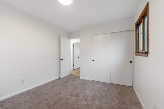 5148 Riverbirch Dr N, Columbus, OH 43229 - unfurnished bedroom with carpet flooring, baseboards, and a closet