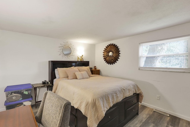 5042 Lindora Dr, Columbus, OH 43232 - bedroom with wood finished floors and baseboards