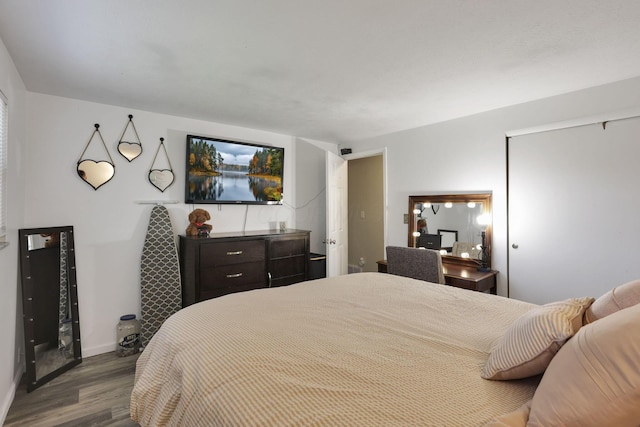 5042 Lindora Dr, Columbus, OH 43232 - bedroom featuring dark wood-style floors and baseboards