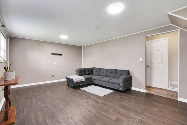 5042 Lindora Dr, Columbus, OH 43232 - living room with dark wood-style flooring and baseboards