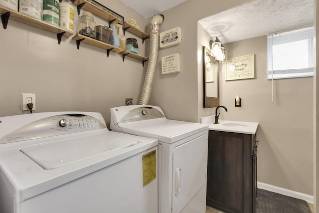 5042 Lindora Dr, Columbus, OH 43232 - laundry area with washing machine and dryer and baseboards