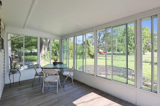5042 Lindora Dr, Columbus, OH 43232 - sunroom with healthy amount of natural light, vaulted ceiling, and view of scattered trees