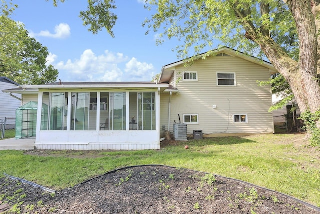 5042 Lindora Dr, Columbus, OH 43232 - rear view of house featuring a sunroom and central air condition unit
