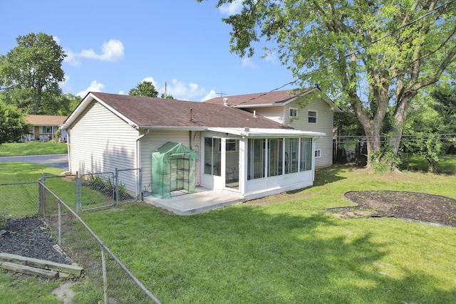 5042 Lindora Dr, Columbus, OH 43232 - rear view of house with a gate, a sunroom, a patio area, and a shingled roof