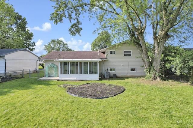 5042 Lindora Dr, Columbus, OH 43232 - back of house with a sunroom and a shingled roof