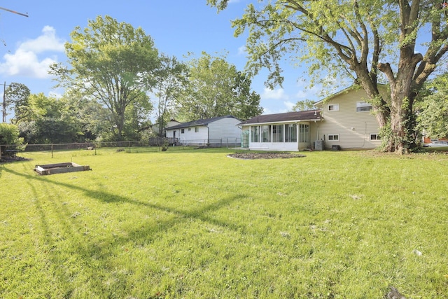 5042 Lindora Dr, Columbus, OH 43232 - view of yard featuring a sunroom and cooling unit