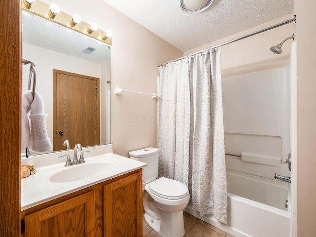 2594 Roberts Ct, Hilliard, OH 43026 - bathroom with tile patterned floors, toilet, shower / bath combination with curtain, vanity, and a textured ceiling