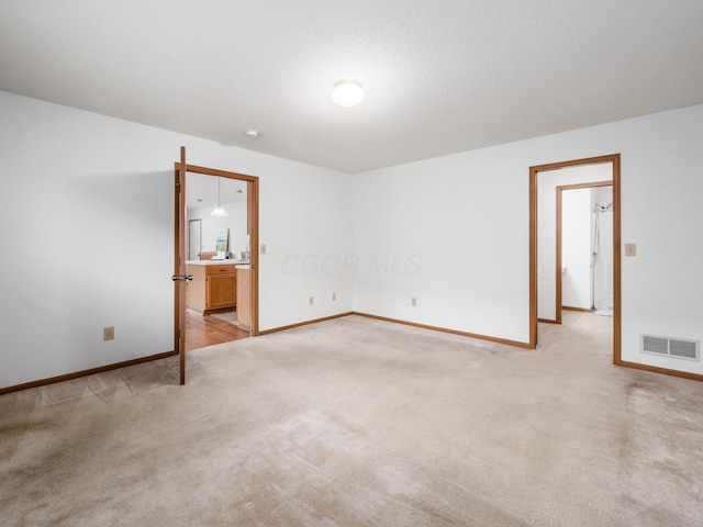 2594 Roberts Ct, Hilliard, OH 43026 - unfurnished room featuring light colored carpet and baseboards