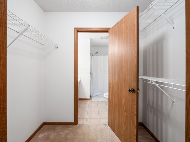 2594 Roberts Ct, Hilliard, OH 43026 - walk in closet with carpet floors