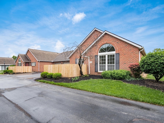 2594 Roberts Ct, Hilliard, OH 43026 - view of front of home featuring brick siding and driveway